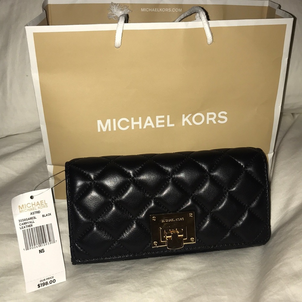 NWT Authentic Michael Kors black leather wallet